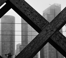 View of Deansgate Square towers through the old railway infrastructure of NT Castlefield