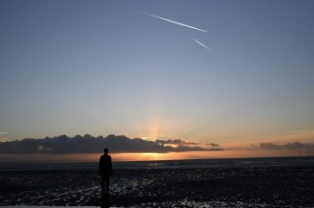 Setting sun and passing planes, Crosby